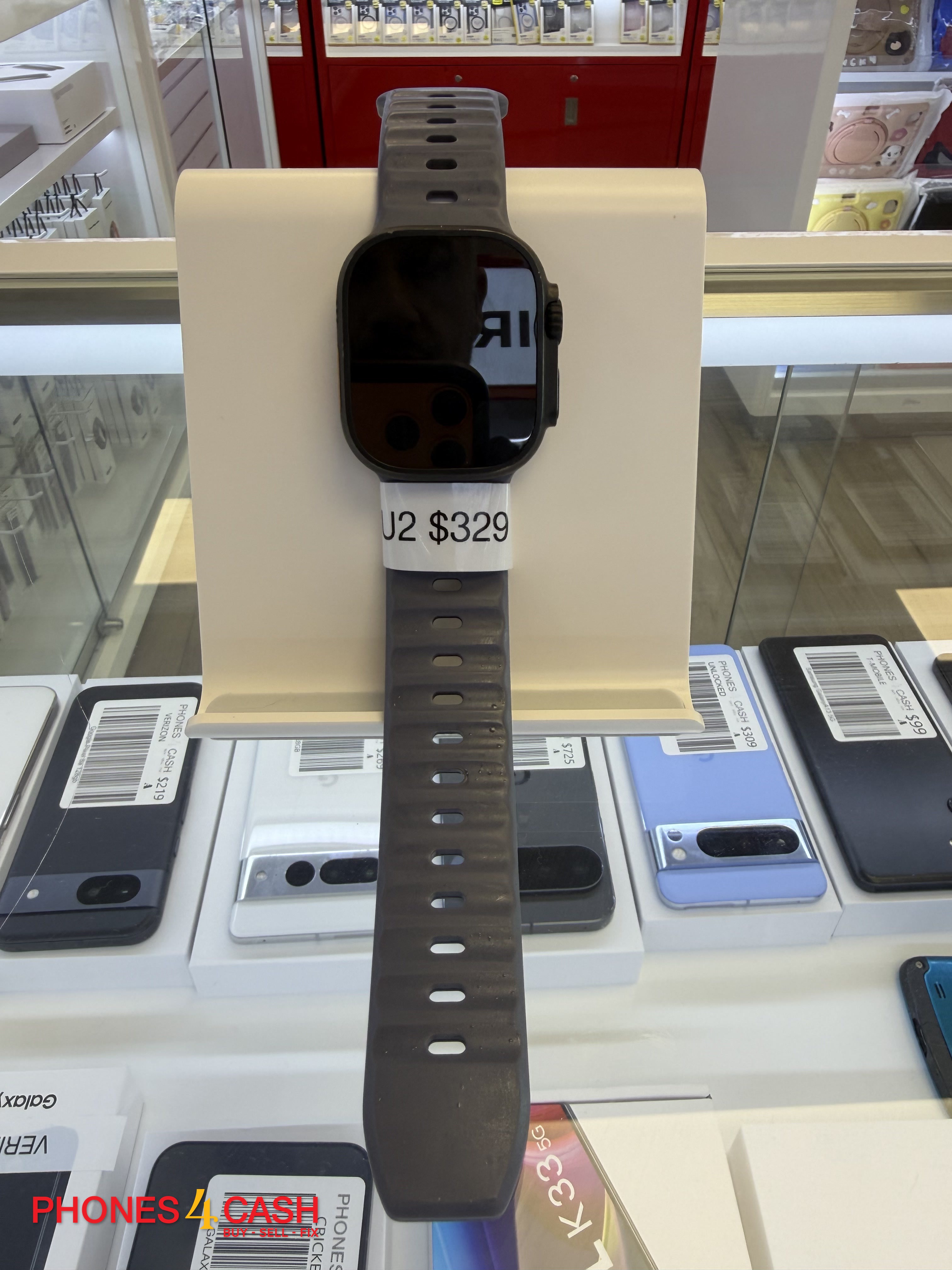 Apple Watch Ultra 2 - 49mm Black Titanium with Ocean Band (GPS + Cellular) - photo 1